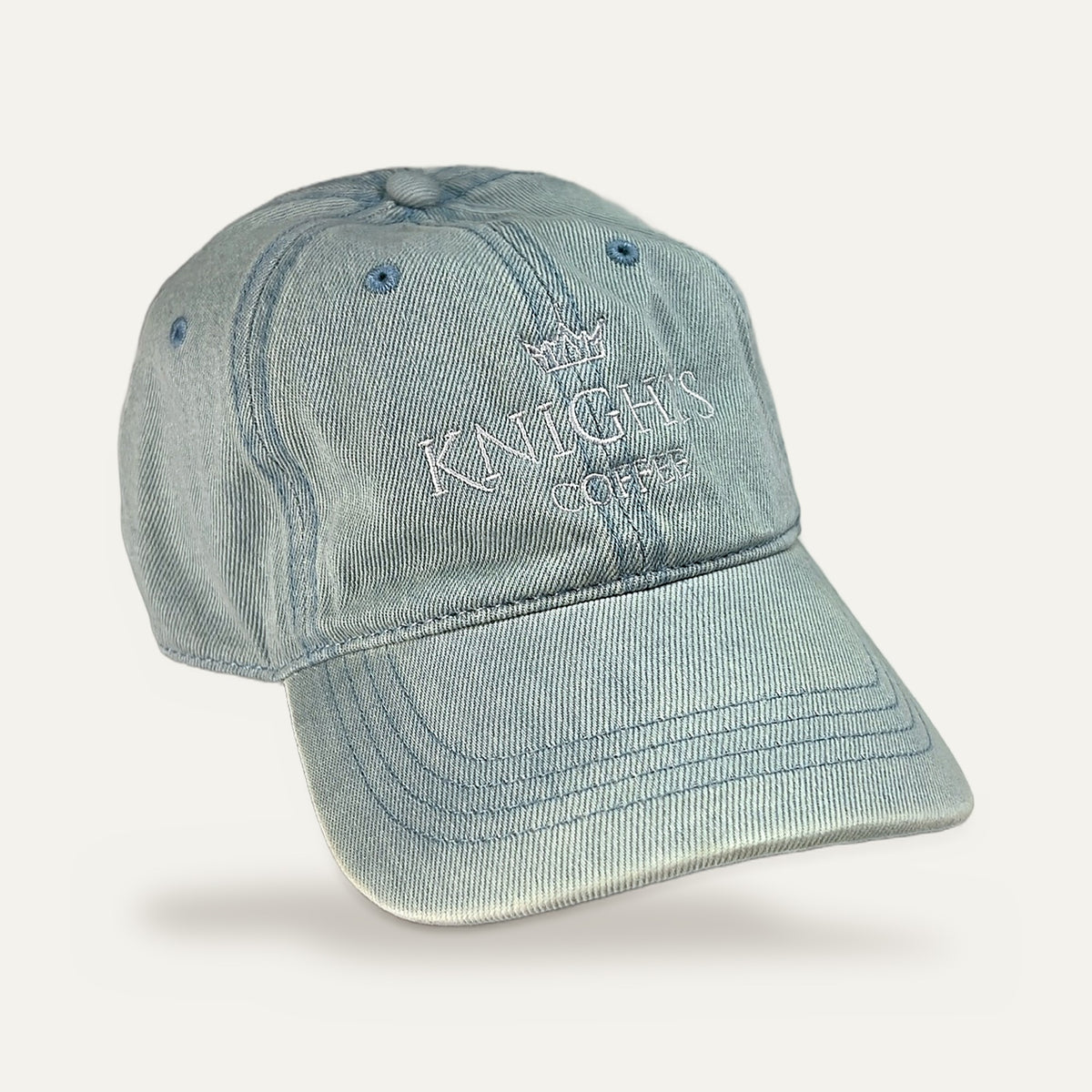 Knights Coffee light denim dad hat with tone-on-tone crown embroidery, three-quarter view